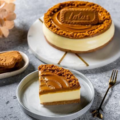 Whole Biscoff cheesecake with a matching slice